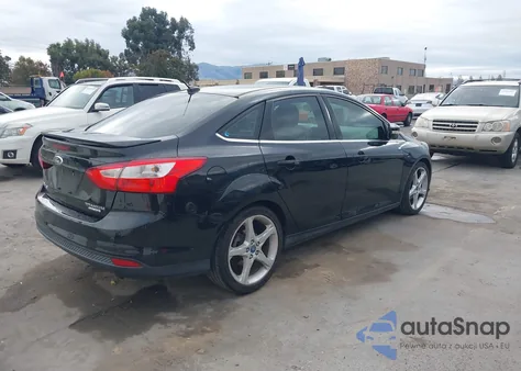 2013 Ford Focus Titanium z USA, uszkodzony, nr VIN 1FADP3J21DL280696